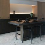 Picture of modern kitchen with dark honed granite countertops.