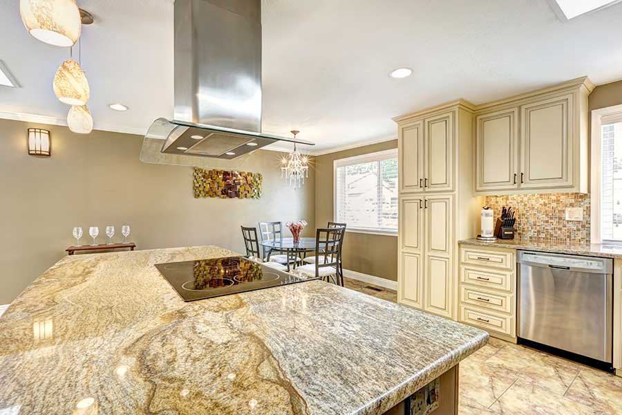 cream and white granite kitchen counters with light brown accents